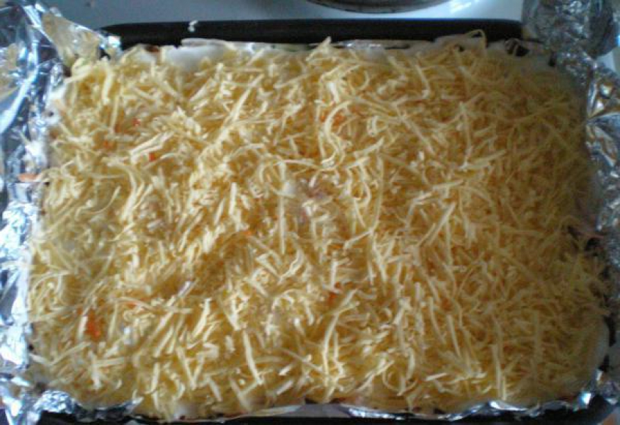 Espolvoreamos el queso y cerramos
