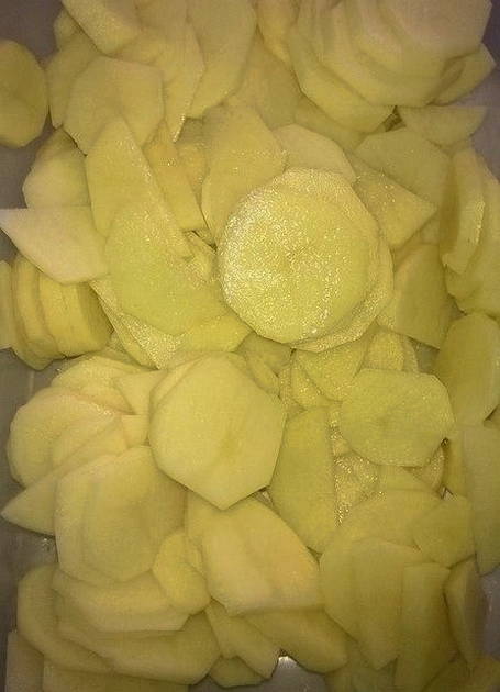 Slice the potatoes