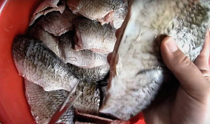 Clean and weigh the fish