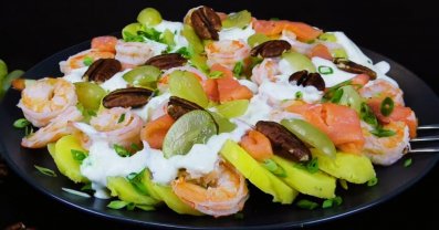 New Year's salad with shrimp and red fish