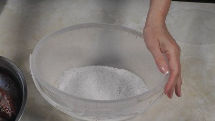 Pour salt into the bucket