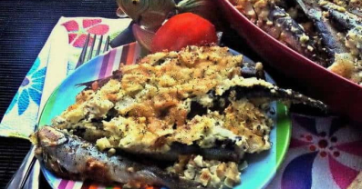 Baked Baltic Herring with Onion under Sour Cream